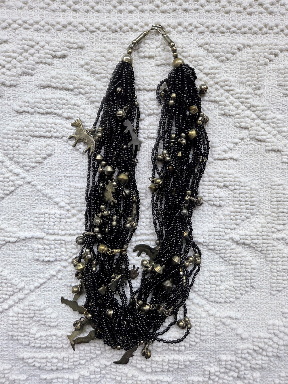 βVintage Multi-Strand Black Bead Necklace with Milagros Animal Characters
